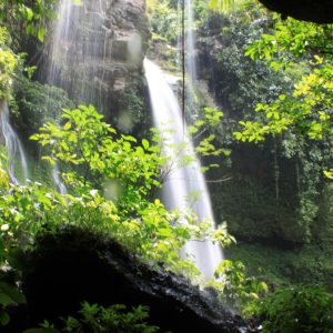 Sebuah air terjun dalam artikel wisata alam terdekat dari sawangan di website ecotown.id