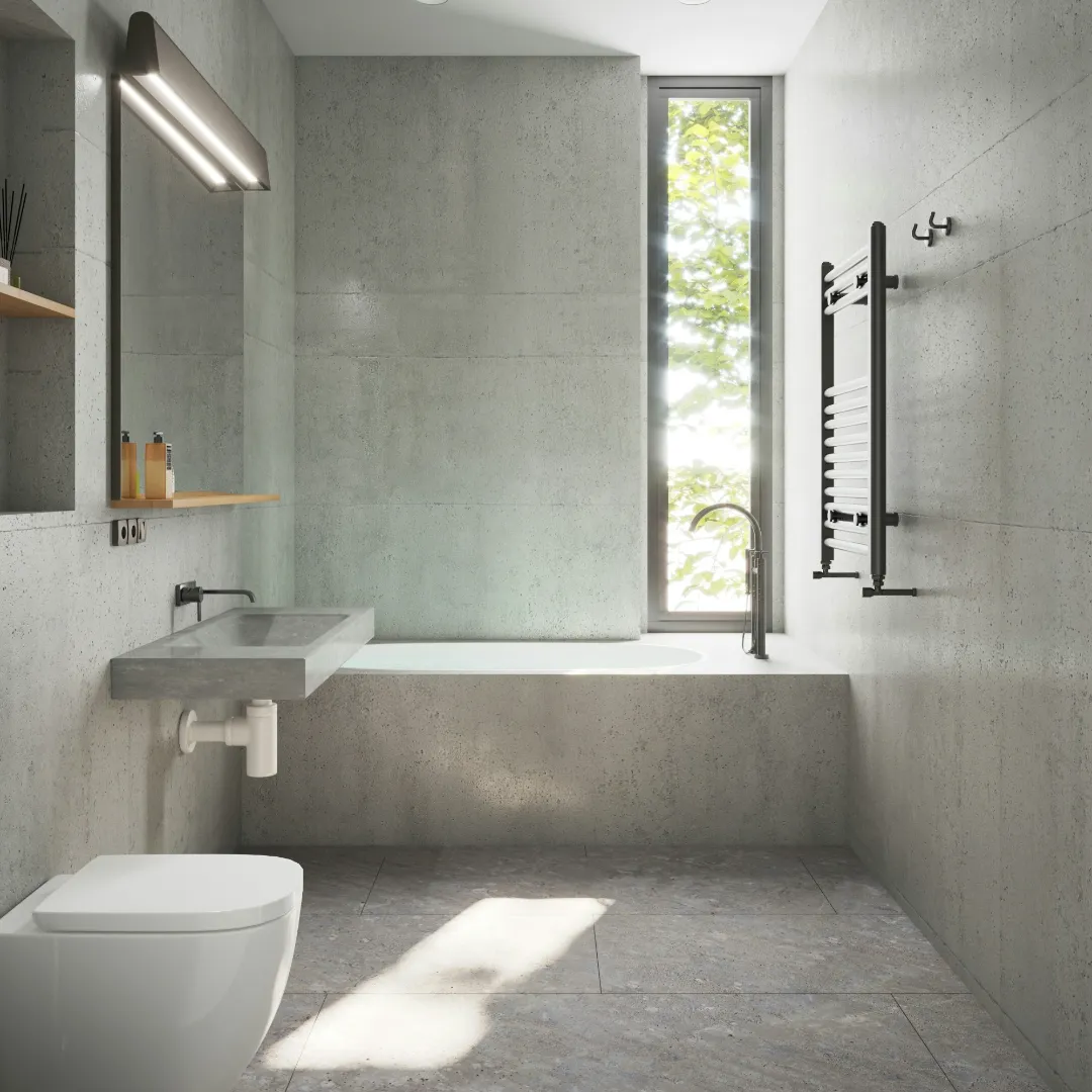 Desain interior kamar mandi minimalis modern bernuansa semen abu-abu dilengkapi wastafel gantung, bathtub, dan pencahayaan alami dari jendela. Gambar ini berada dalam artikel "Renovasi Kamar Mandi Minimalis" di website Ecotown.id